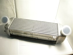Радиатор интеркуллера H.SANTA FE NEW с 12-15г. ориг. (28271-2F000) - фото 31081